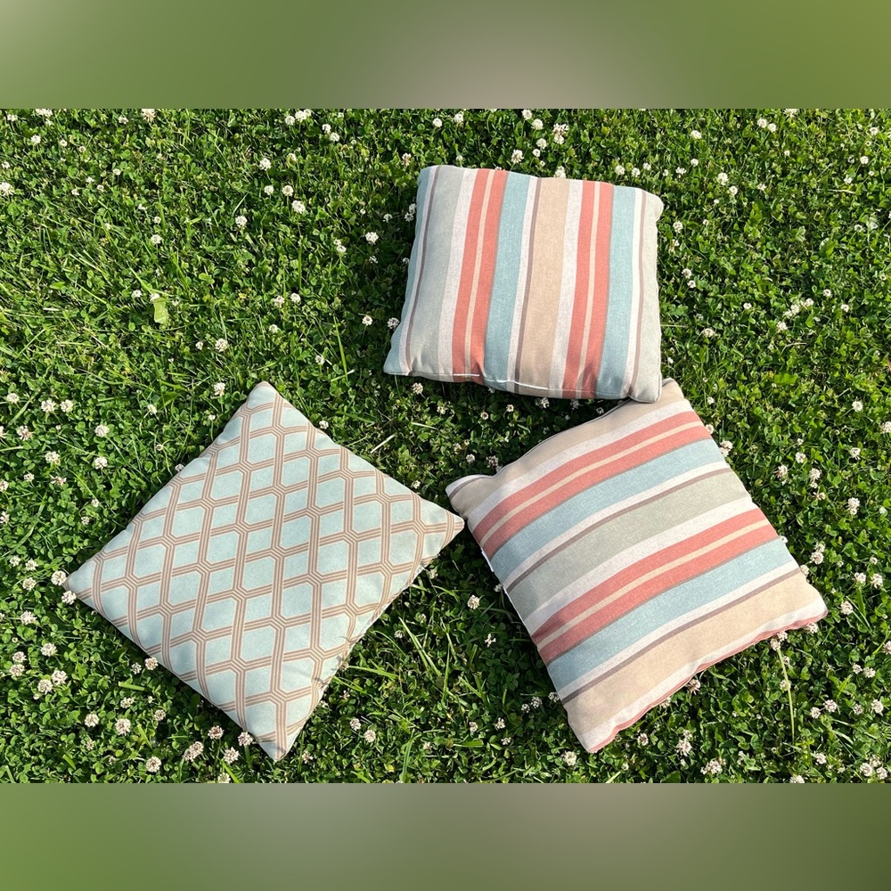 Three patio outdoor pillows